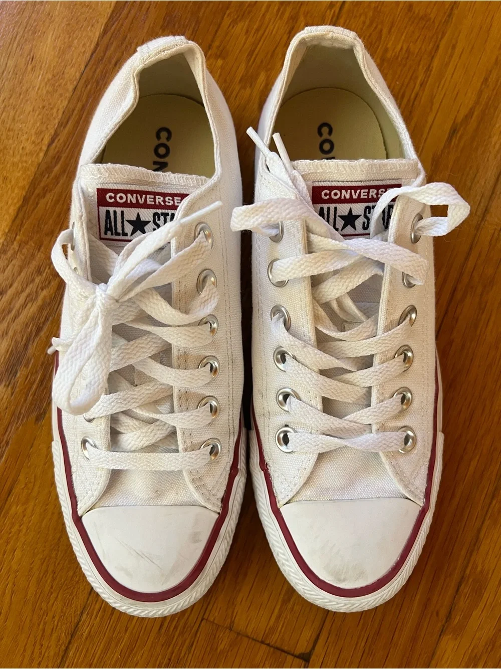 Converse Low Top Canvas Sneakers in White with Red Trim
